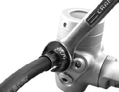 Remove the port plug from an MP port on the regulator using an appropriately sized wrench. WARNING: DO NOT connect the inflator hose to a high pressure (HP) port (greater than 200 psi / 14 bar).
