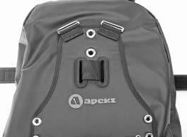 2. Turn the buoyancy cell over and place the ultralight plate on top with the Apeks logo face up. Insert the cylinder band end through the oval grommet hole in the ultralight plate on the same side.