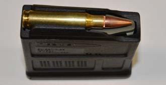 Follower and sliding the cartridge under the Feed Lips. See Figure 3. 4. First cartridge shown fully loaded.