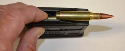 Use your finger to press down on the first loaded cartridge to make it easier to load the next cartridge.