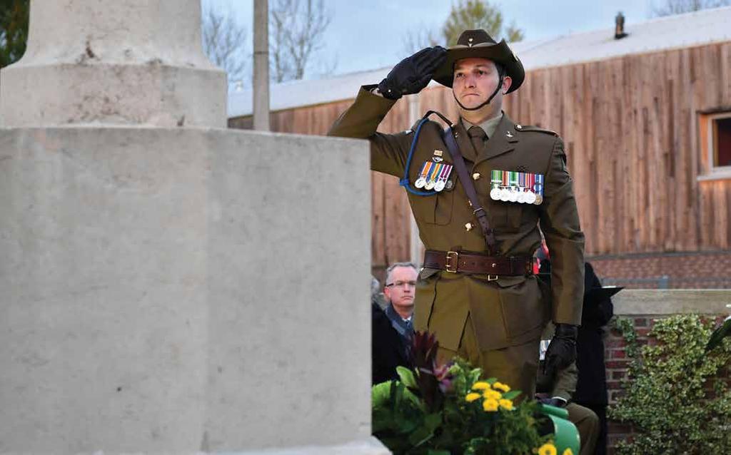 ARMYPEOPLE07 Major Tim Laurin, Australian Army, salutes REMEMBERING THE FIGHTERS AND FALLEN ON THE WESTERN FRONT It was on the blood-soaked battle fields of France and Belgium where New Zealand lost