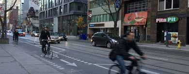 Cycle tracks help improve cyclist safety by providing greater separation from cars than traditional bike lanes.