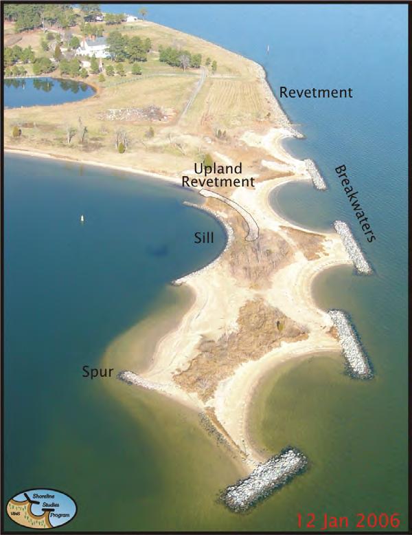 sections of the property. In most cases, breakwater construction includes the addition of sand between the stone breakwater and the shore. In lower energy settings, sand may be vegetated.