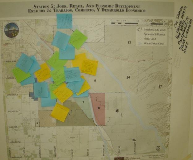 At Station 5: Jobs, Retail and Economic Development, the map board illustrates economic development subareas in colors (and other types of areas in grey).
