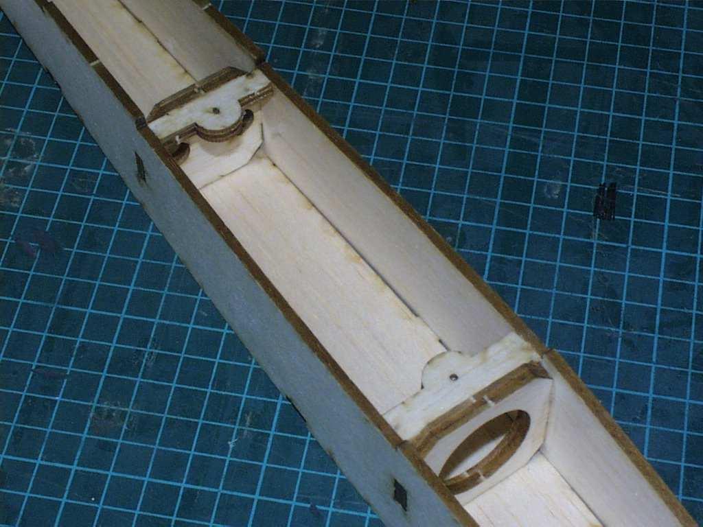 (Figure 4.11) Install triangular stock to the top side of the fuselage. (Figures 4.12 and 4.