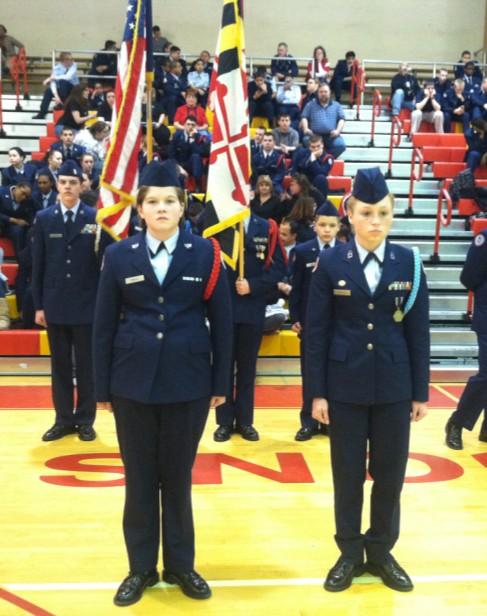 C/2nd Lt Benton and I were standing in front of our color guard like all the other schools. We agreed that we would go up for our own events and switch for the other events if we got any trophies.