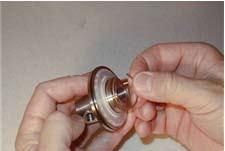 (52). Step 6: Flapper valve