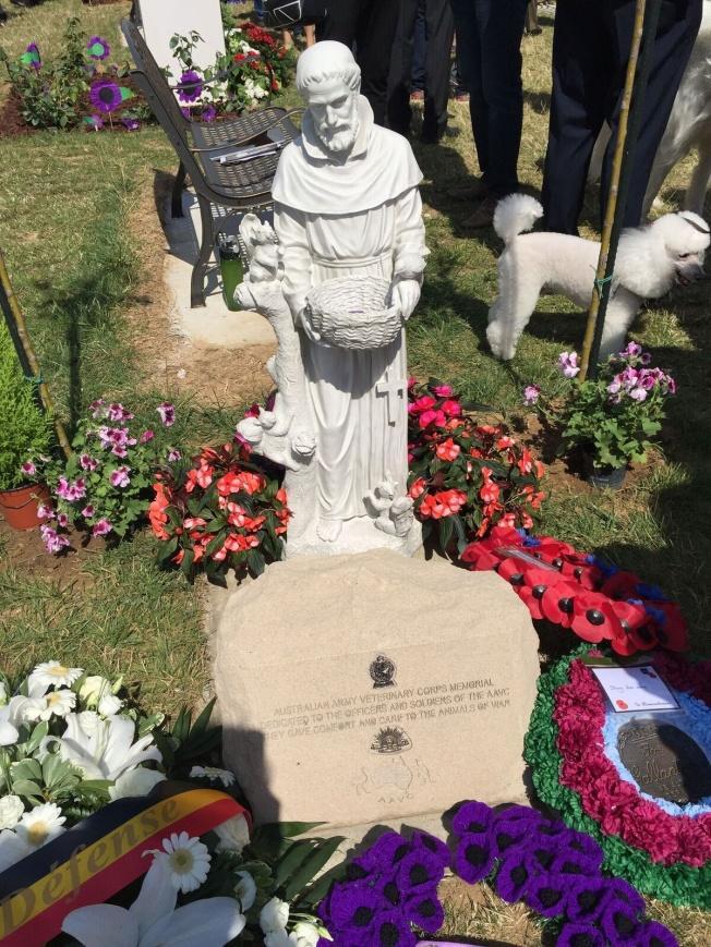 In the foreground is St Francis patron saint of Animals, he looks over the memorial to the Veterinary members who looked