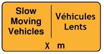 ection 3 - Traffic Control Devices low Moving Vehicles Ahead Description: The low Moving Vehicles Ahead sign warns road users of the possible presence of slow moving trucks that