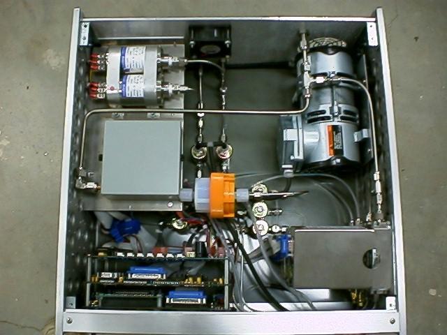 Figure 2 is a picture of the interior of the Model 2200-2 showing the sampler components which consists of the following: 3-Way Canister Solenoid Valves Canister Filter Pressure Transducers Ozone