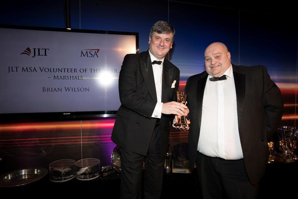 2017 Marshal category winner Brian Wilson (Omagh Motor Club) Brian Wilson receiving his award from Richard Rainbow of JLT.