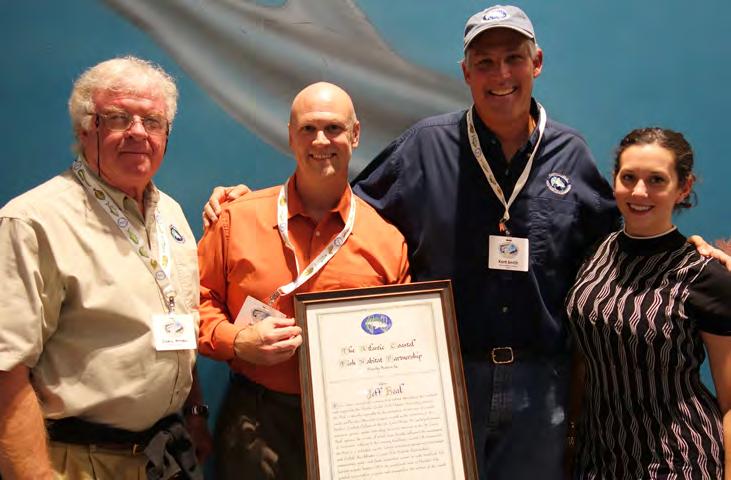AUAL AWARDS From left: Chris Powell, ACFHP Vice Chair; Jeff Beal, FL FWCC; Kent Smith, ACFHP Chair; Lisa Havel, ACFHP Coordinator fishermen illegally selling striped bass to a seafood store.
