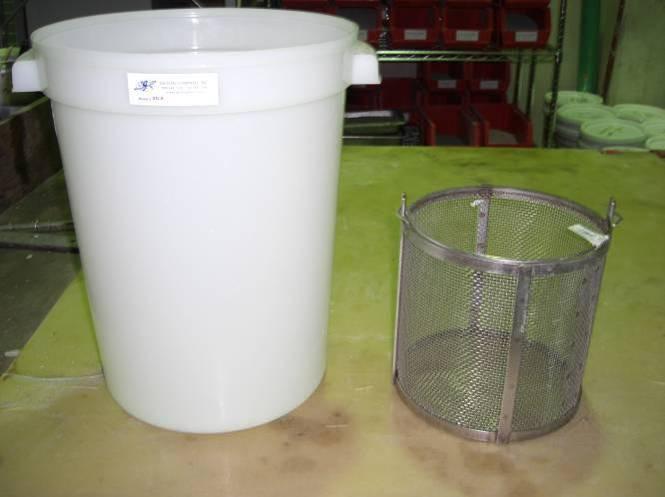 Figure 2-6: From left to right water bucket, sample container, pycnometer, and pycnometer ring. 2.5 SCC Mix Apparatus The SCC mixes were mixed using a Gilson Mixer Model No.