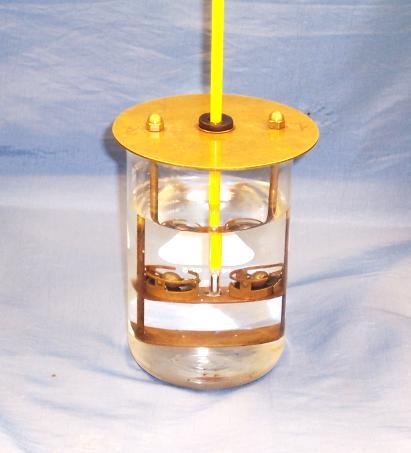 6.4 Suspend the thermometer so that the bottom of the bulb is level with the bottom of the ring and within 0.635 cm (3/4 in) but not touching the ring.