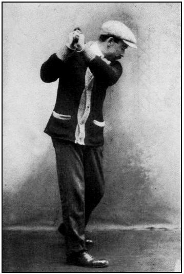 406 THE AMERICAN GOLFER Plate No. 4, showing proper position wrists at the top of swing. of the it should.