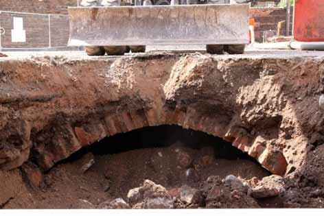 11 Plate 5: Excavated culvert at the rear of the Mansion House 3.2.