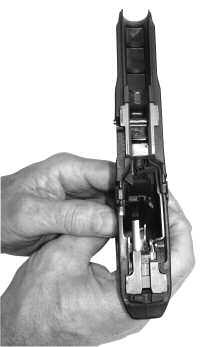 Excess lubricant can collect quantities of unburned powder and carbon residue, which could interfere with proper functioning of the pistol (Figures 24 & 25).