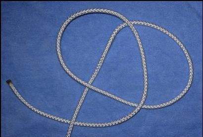 From this point on, the carrick bend knot follows an over/under pattern.