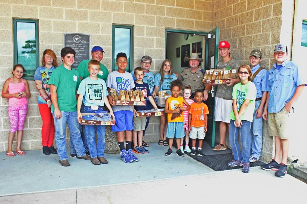 Cookies for Cops County-Wide Community Service On Friday, July 22, 2016 4-Hers from many of the Chambers County 4-H Clubs came together to deliver cookies to the