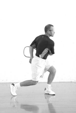 almost shoulder height, the wrist is about head height, and the racquet head is about head height or higher.