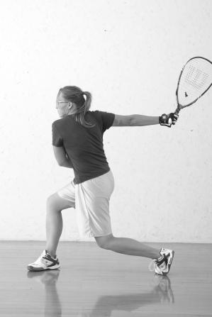Ideally, ball contact should occur at your center of gravity, which if you are rotating your hips properly and the back foot is pivoted, will be near the front foot.