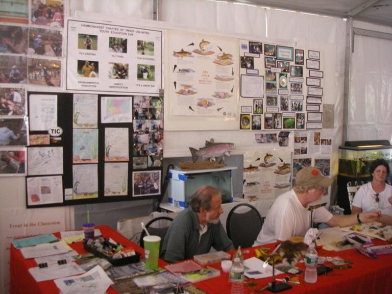 Walt Sanford and Jim Woodworth at the Trout In The Classroom exhibit at the Durham Fair last fall. Stream Flow Protection Regulations Are In Trouble.