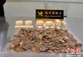 AFRICA ASIA CHINA February 21, 2017 Yiwu Airport, Hangzhou, Zhejian Province, China Seizure in a box of cookies from a bag of a passenger traveling from the Democratic Republic of the Congo via Hong