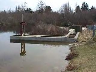 Figures 13-14. Chase Mill Stream is a tributary to the East Machias River. Fishing gear is deployed at the top of the fishway to capture returns to Gardiner Lake.