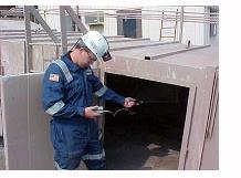 The employee who remains outside the confined space and; monitors the entrant(s) guards the space against