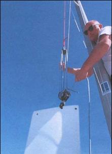 - - Bring the trailer in the water until the forward cradle is in the water. - Guide the boat straight in the trailer. - Secure the boat with the trailer straps on the forward winch.