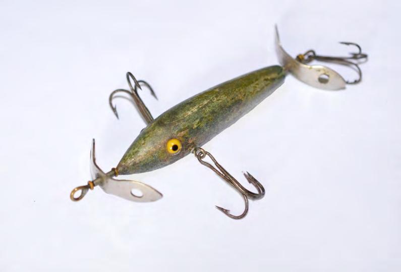 Woods, Alliance, Ohio 3-inch green wood lure body 4 ½- inch overall length This lure features through-body twisted wire hook hangers & line tie connection,