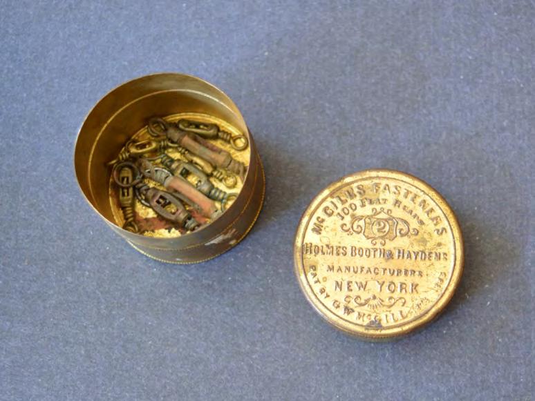 Brass Tin with various sizes of Box Swivels The underside of the tin is marked McGill s Fasteners, 100 Varieties, Manufacturers of Brass Goods