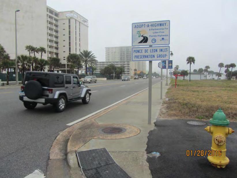 Issue #10: Sidewalk Sign Obstruction Location: Mid-Block between Park Avenue and Botefuhr Avenue Figure 23 Description of Issue: The secondary sign below the Adopt-A-Highway sign just south of Park