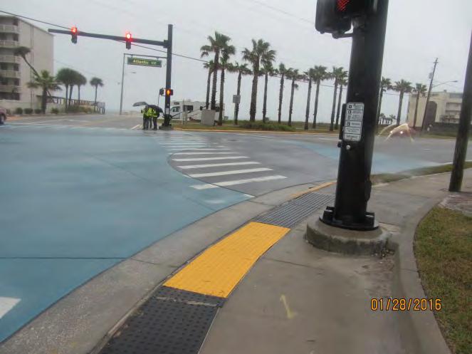 and Figure 44. Adequate 4 continuous clear width for the sidewalk is not provided based on ADA PROWAG section R30
