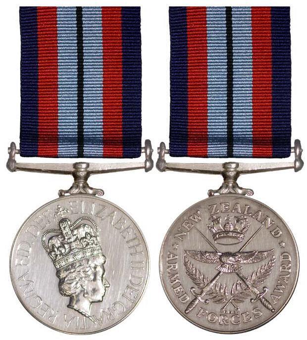 THE NEW ZEALAND ARMED FORCES AWARD 5 A circular, silver medal bearing on the obverse the Uncrowned Effigy of the Sovereign, and on the reverse two swords in saltire, points upwards, superimposed in