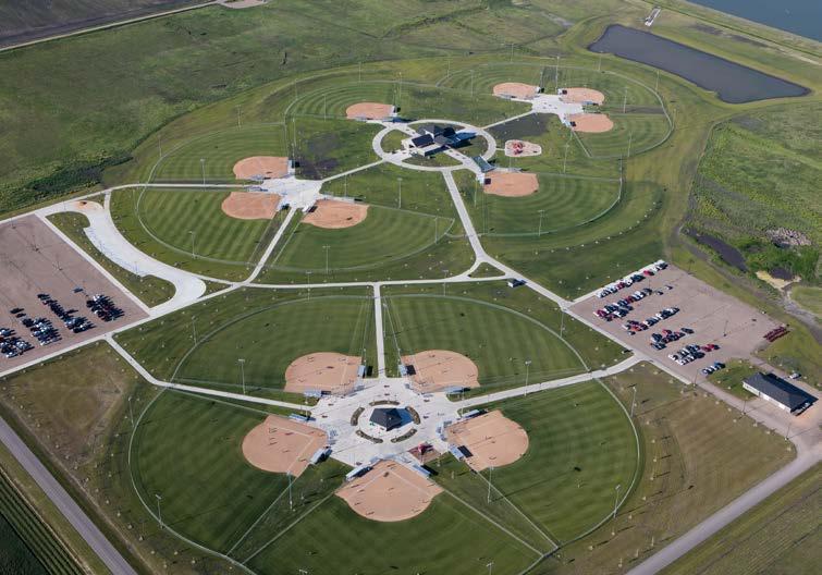 North Softball Complex Fargo, ND 18 total fields - 14 slow pitch and 4 fast pitch Dual championship 8 diamond ring 18 fields with lights 840 parking spaces Field dimensions: 250,