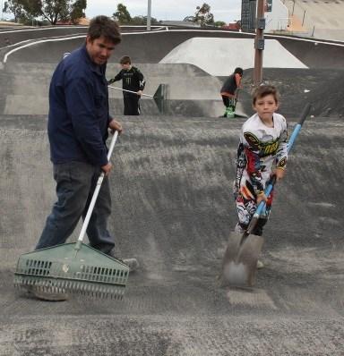 We had mums, dads and kids on the track scrapping away the loose surface on top.