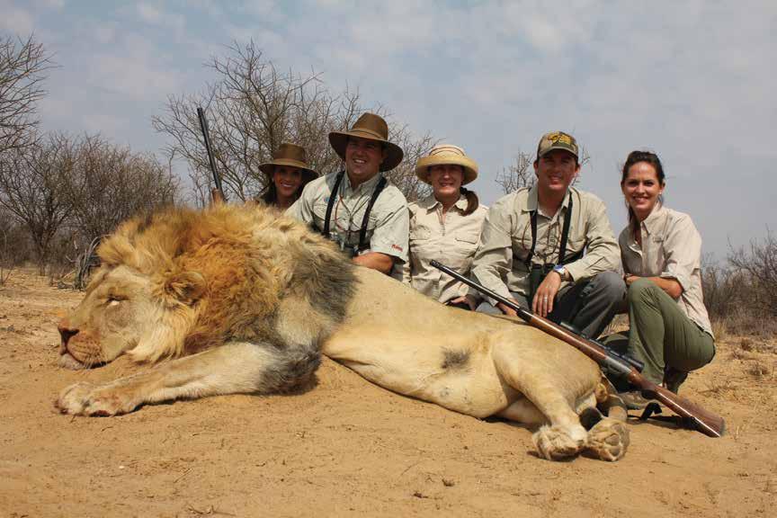 Heath & Mattie McCall - Florida Heath and Mattie (far right) took this beautiful Lion with Johnny Demos Heath and Mattie, what a lovely couple.