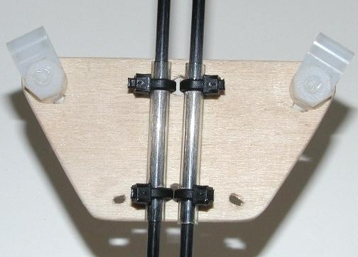 Keep the sides of the clamps aligned to the sides of the plate.