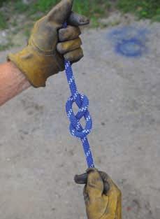 Appendix D Ropes and Rigging D-21 4. Pass your hand through the bight created in Step 1 and grab the working end of the rope (both pieces) through the loop created in Step 2. (Step 4) 5.