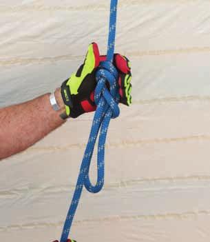 Hold the rope vertically, with the left hand above the right hand. (Step 1) 2.