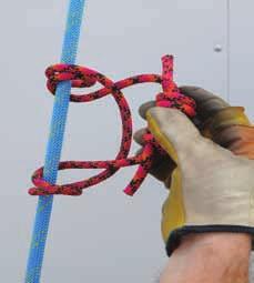 Roll the knot around rope to be attached.