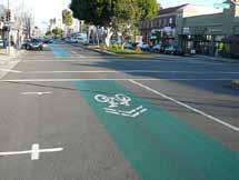 9.9 Shared lane Marking with Colored Pavement Design Summary A standard Shared Roadway Bicycle Marking per CAMUTCD, is used in conjunction with colored pavement to indicate optimal lane position for