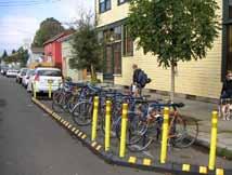 9.19. On-Street Bicycle Parking ( Bike Corrals ) Design Summary Bicycle corrals utilize on-street space for bicycle parking in areas otherwise used for vehicular loading or parking.