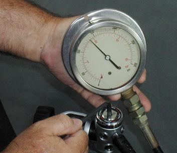 4.5.2 Attach the regulator to a tank valve giving a source pressure of between 2700 and 3500 psig (186-240 Bar). 4.5.3 Turn the supply air on slowly while listening for any unusual air leaks.