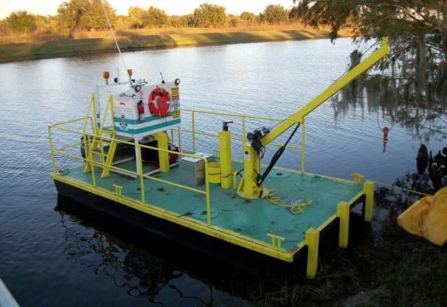 The support boat then positions the forward anchors so the dredge can swing between them. The rear spud acts as the pivot point.