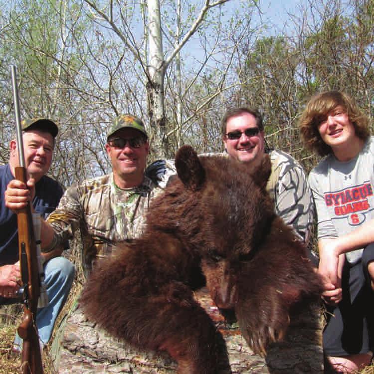 SEPTEMBER 2012 PHRA 17 Andy McDonald and Lew Shanks with Andy s bear on Hunt BL140.