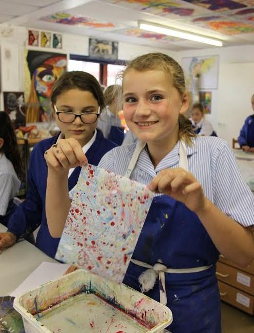 They plan to use their marbling paper to design and create