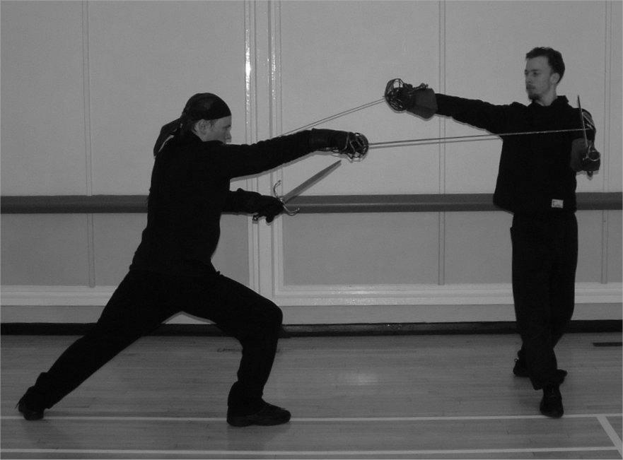 Defending with the dagger The dagger is generally used to augment the primary defence, which may be a parry with the sword, a void with the body or a counter attack in contratempo [using your