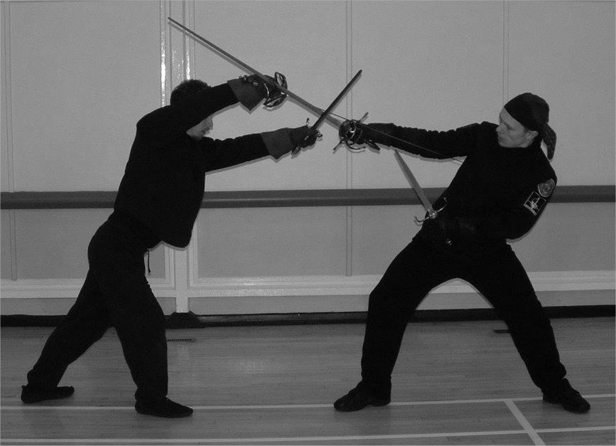 The dagger should come into contact with you opponent s blade at the same time as, or fractionally after your sword does.